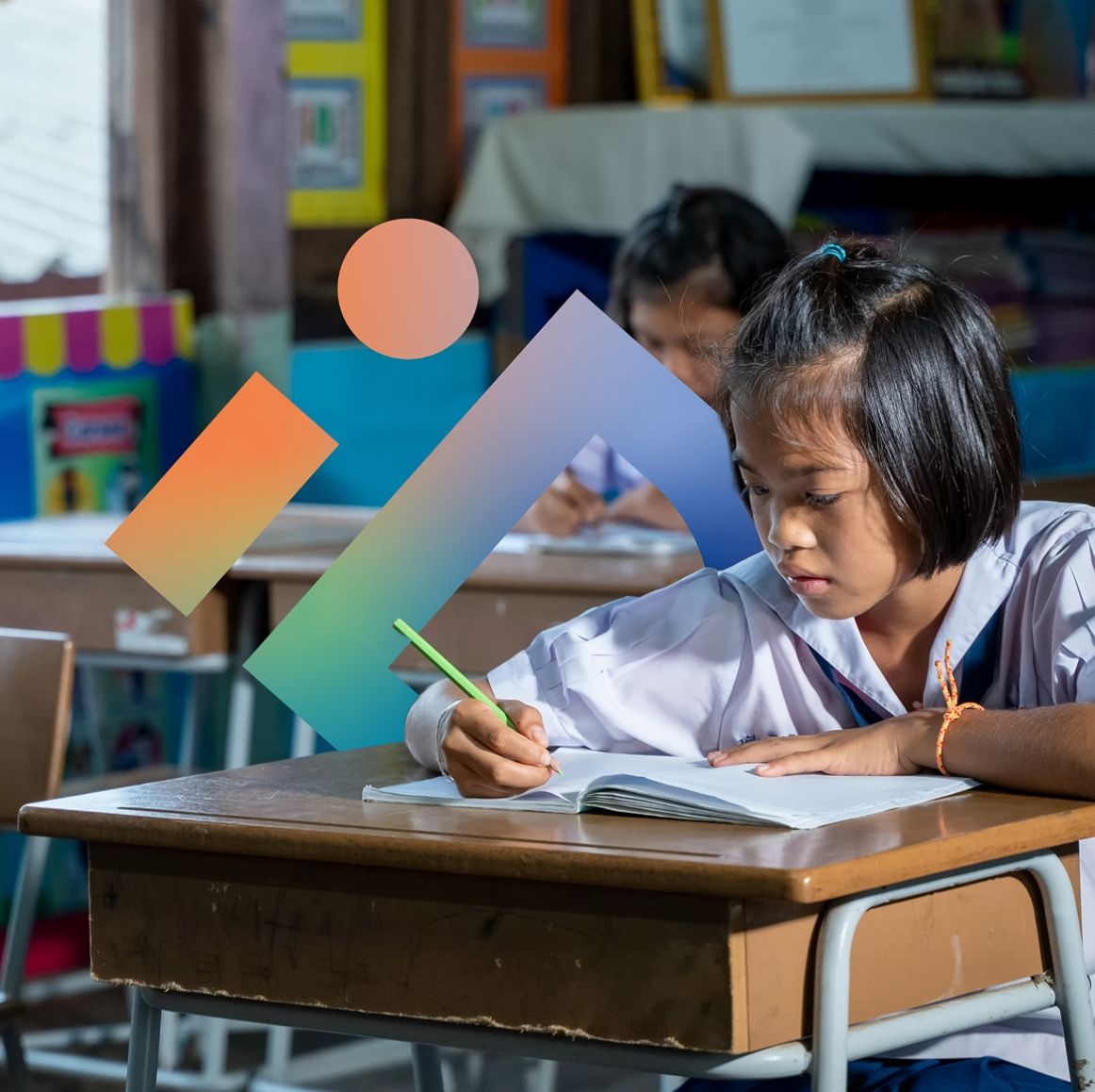 Photograph of children smiling and learning together, used in the International Diabetes Federation (IDF) KiDS programme to promote inclusion and education.