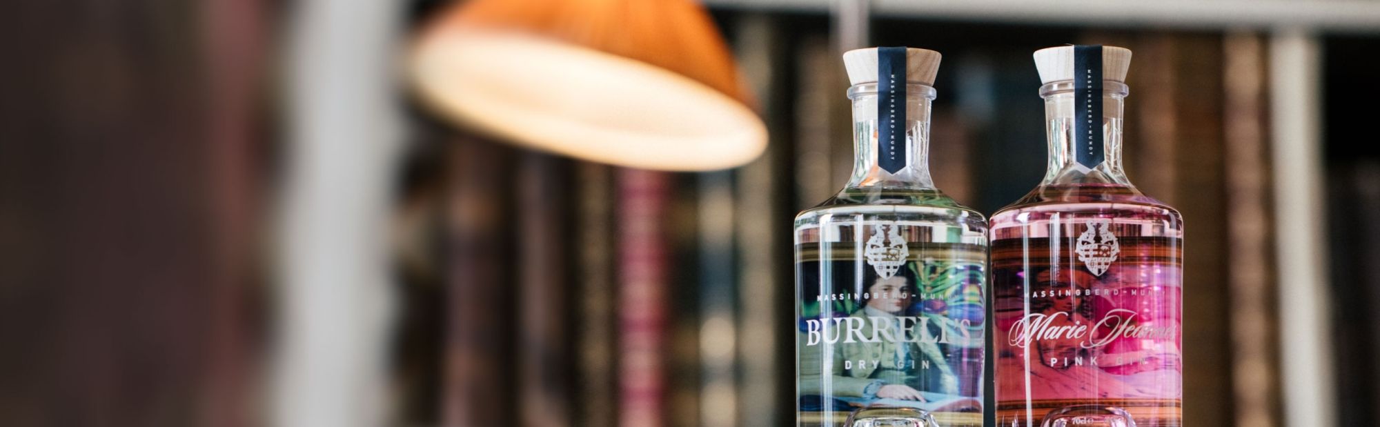 https://www.optimadesign.co.uk/assets/images/common/two_bottles_of_Burell_s_Gin_designed_by_Optima_s_print_team.jpg